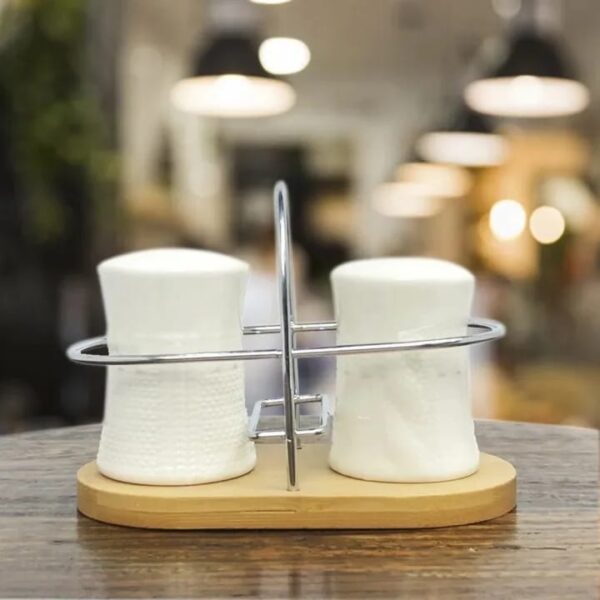 WhatsApp Image 2026-06-29 at 2.47.51 PM (2) Elegant Ceramic Salt & Pepper Shaker Set with Wooden Base & Metal Holder